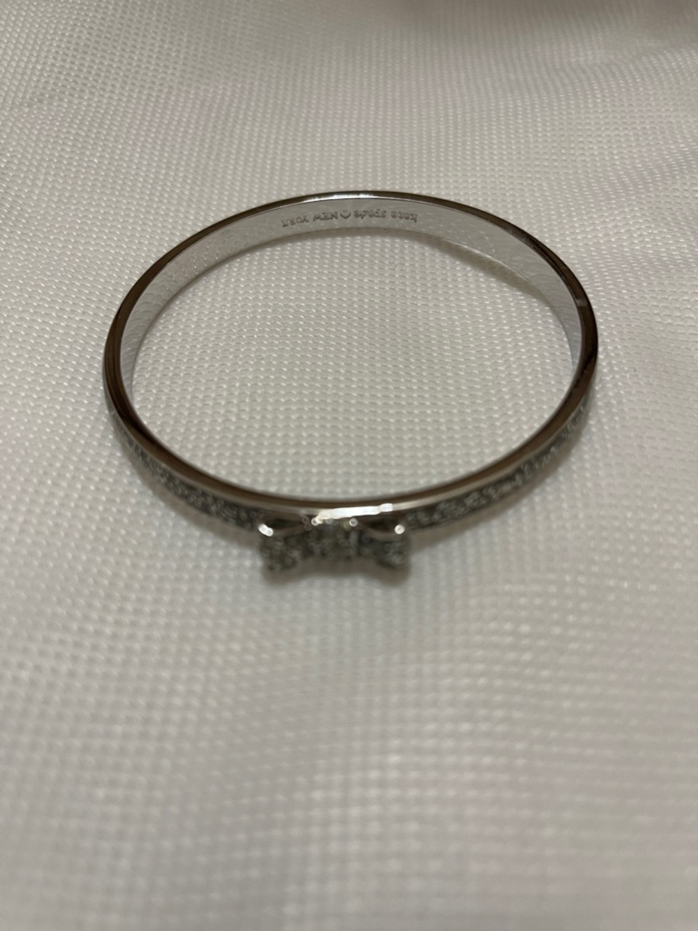 Kate Spade silver bow bracelet excellent condition